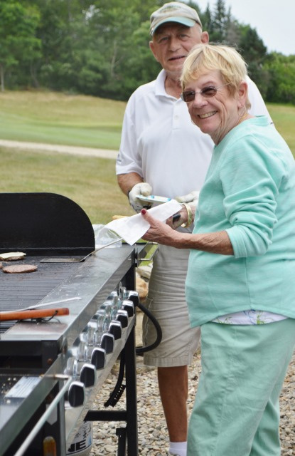 Lion Martha Chase, in front, and Richard MacDonald at the Whitefield Lions Club's 12th annual golf tournament held July 14 at Sheepscot Links in Whitefield.