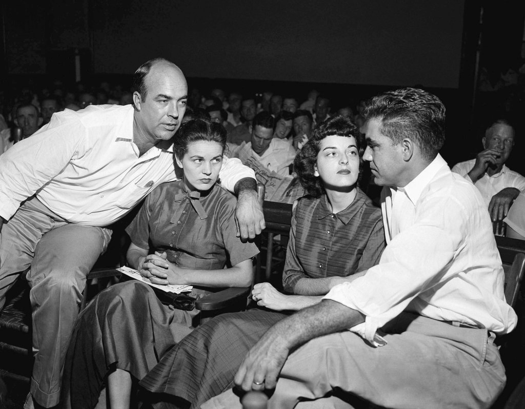 A Sept. 23, 1955, photo of, from left: J.W. Milam, his wife, Carolyn Bryant and Roy Bryant in a courtroom in Sumner, Mississippi. Bryant and his half-brother Milam were charged with murder but acquitted in the kidnap-torture slaying of 14-year-old Emmett Till.