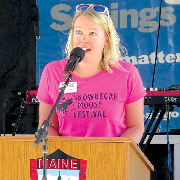 Kristina M. Cannon, executive director of Main Street Skowhegan, gives the welcome address at the Moose Festival in Skowhegan June 9, 2018. Contributed photo