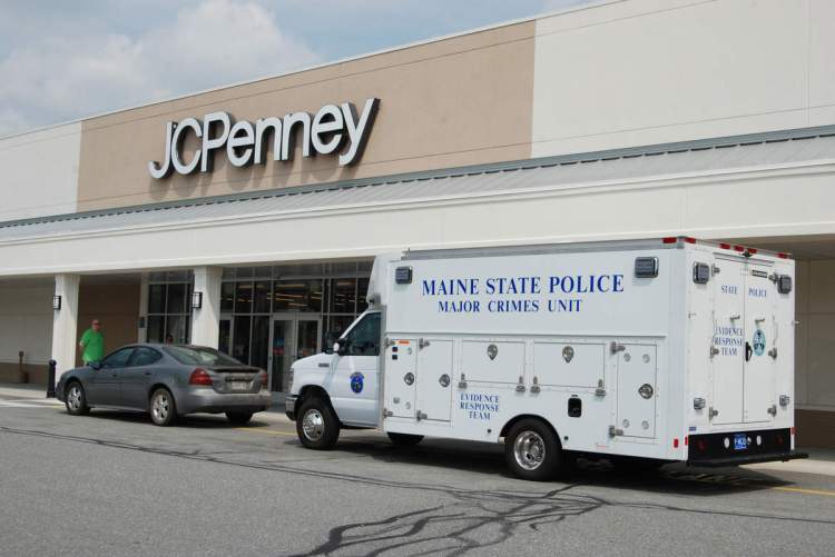 Police investigate a burglary at the J.C. Penney store in Rockland September 2015. Three men were charged in a string of burglaries to businesses in several counties. 