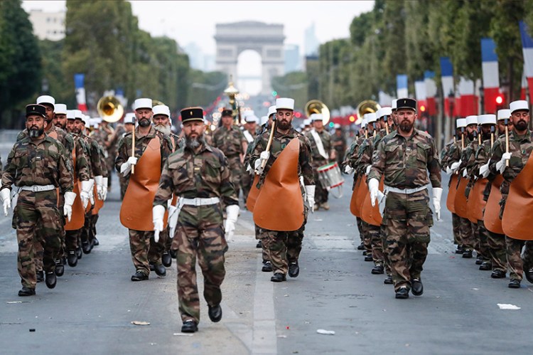 Soldiers of the French Foreign Legion parade on the Champs Élysées avenue during a rehearsal for Bastille Day on Wednesday in Paris.