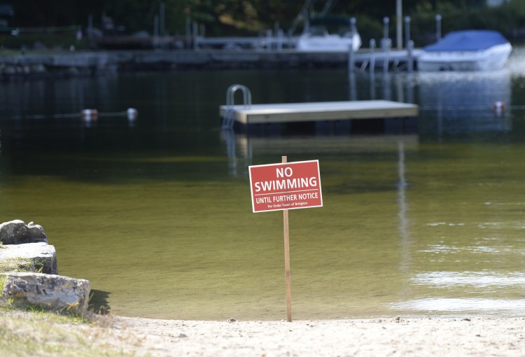 The town of Bridgton closed Highland Lake Beach to swimming Friday for the second time this summer because of high levels of E. coli in the water, but it has reopened after tests showed the E. coli count had dropped.