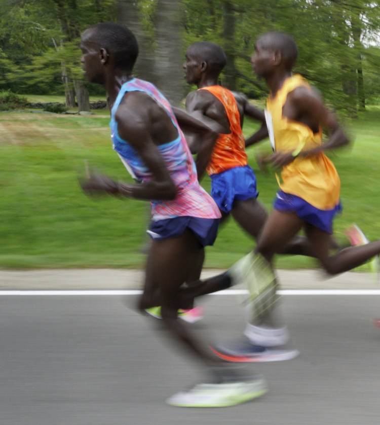 The lead pack in last year's race included, from left, Stephen Sambu, Leonard Kiplimo-Barsoton and Stephen Kosgei-Kibet, all of Kenya. Kosgei-Kibet won the race. This year, three Kenyans and four Ethiopians in the race represent the smallest contingent of African runners in Beach to Beacon history.