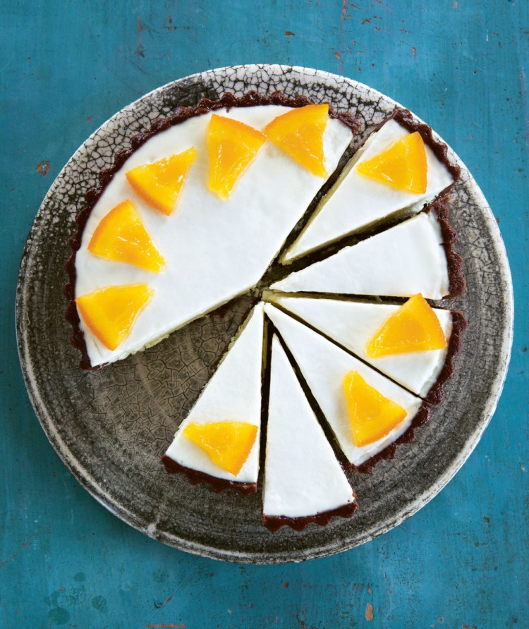 Before serving Ginger-Chocolate & Orange Frozen Tart, place it in the fridge for 30 minutes to soften slightly.