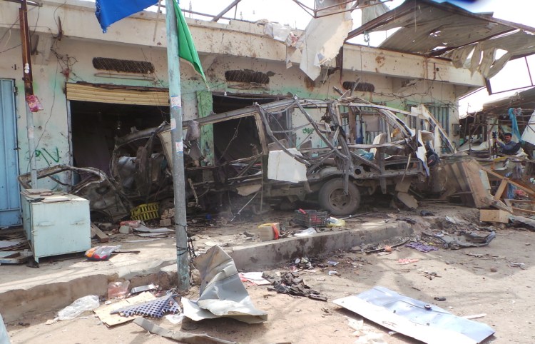 Wreckage of a bus remains at the site of an airstrike in Saana, Yemen, on Friday. Yemen's Shiite rebels are backing a U.N. call for an investigation into a Saudi-led coalition airstrike.