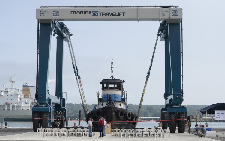 Portland Shipyard and Portland Yacht Services initiated service of this 330-metric-ton Marine Travelift in a ceremony Tuesday on Portland’s western waterfront. The lift, which hoists large boats from the water and moves them to workshops on land, is crucial to a plan to develop a boat- and ship-repair complex at a vacant rail yard. The crane is the latest development for the Canal Landing marine complex at 400 West Commercial St.