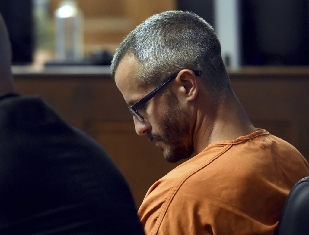 Christopher Watts looks down during his bond hearing Thursday in Greeley, Colo.