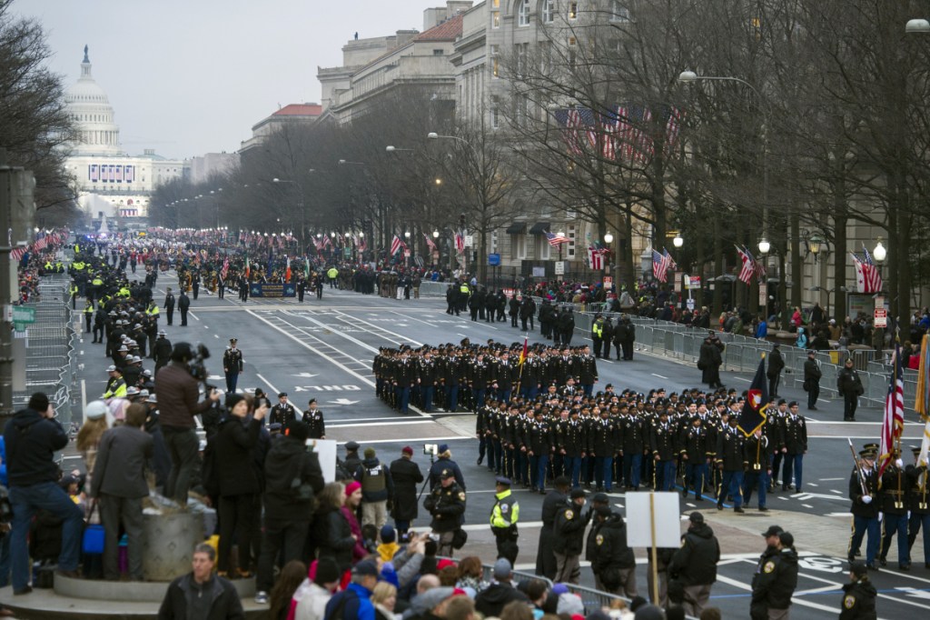 Military units participate in Trump's inaugural parade in 2017. The military parade he requested has been postponed.