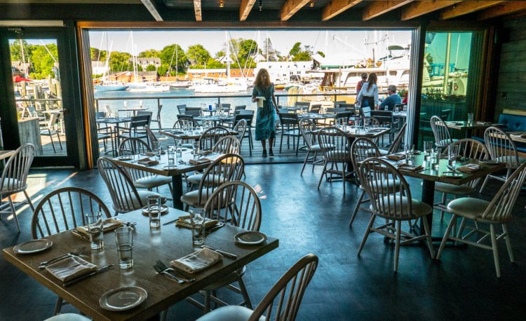 The Hoxbill dining room and deck afford spectacular views of Camden Harbor.