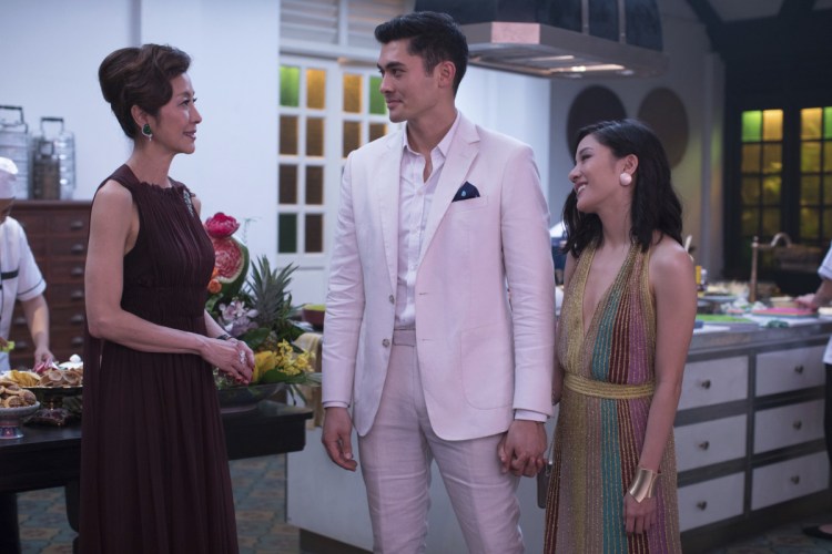 Michelle Yeoh, from left, Henry Golding and Constance Wu in a scene from the film "Crazy Rich Asians." 