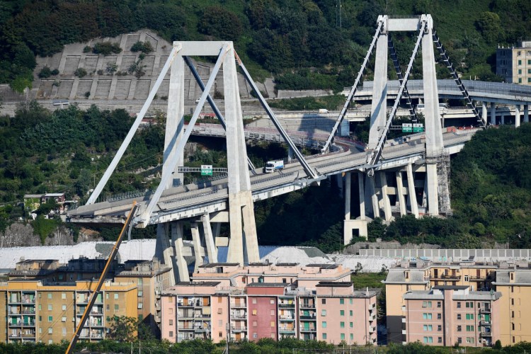 A view of the collapsed Morandi highway bridge in Genoa, Italy, on Sunday. The unofficial death toll in Tuesday's collapse rose to 43 on Saturday.