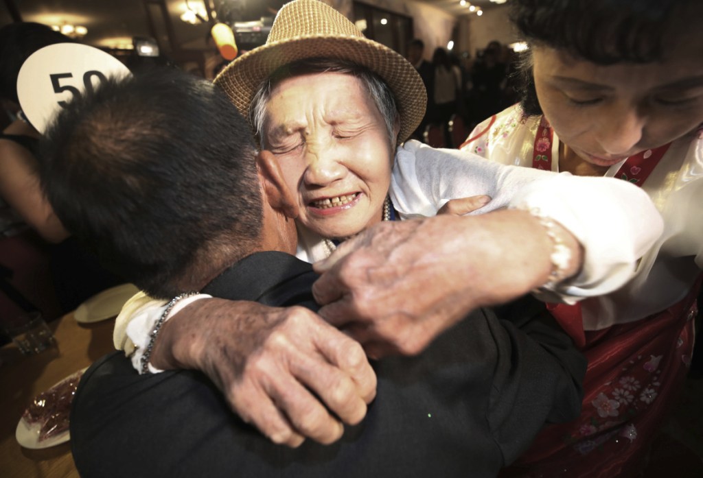 South Korean Lee Keum-seom, 92, hugs her North Korean son Ri Sang Chol, 71, during the Separated Family Reunion Meeting at the Diamond Mountain resort in North Korea.