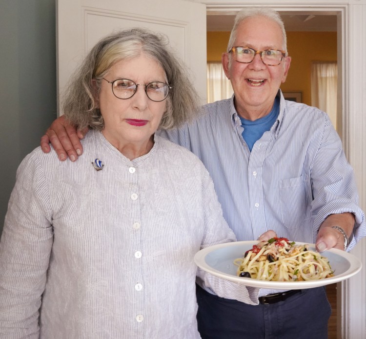 Peter and Terry Weyl with a plate of Marco Polo Spaghetti at their Portland home on Monday. "Tuna? Swiss cheese? Not what you might expect, but darned tasty," Terry Weyl says of the dish.