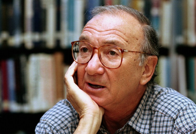 American playwright Neil Simon answers questions during an interview in Seattle, Wash. Simon, a master of comedy whose laugh-filled hits such as "The Odd Couple," "Barefoot in the Park" and his "Brighton Beach" trilogy dominated Broadway for decades, died on Sunday. He was 91.