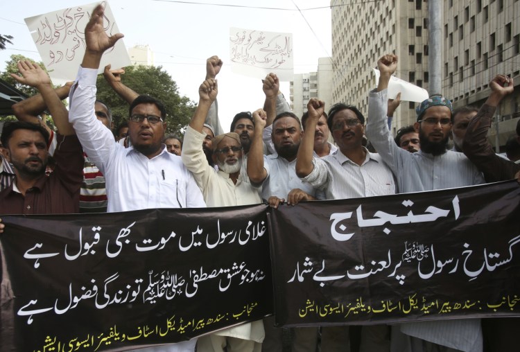 Pakistanis protest Wednesday in Karachi against a Dutch lawmaker's plans to hold a Prophet Muhammad cartoon contest. Depictions of the prophet are forbidden in Islam.