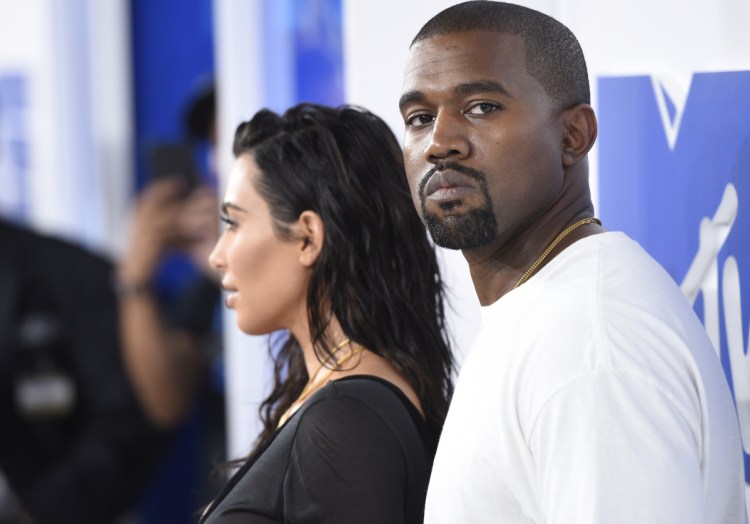 Rapper Kanye West with his wife, Kim Kardashian West, at the MTV Video Music Awards. He issued a mea culpa on a Chicago radio station for calling slavery a "choice" earlier this year.