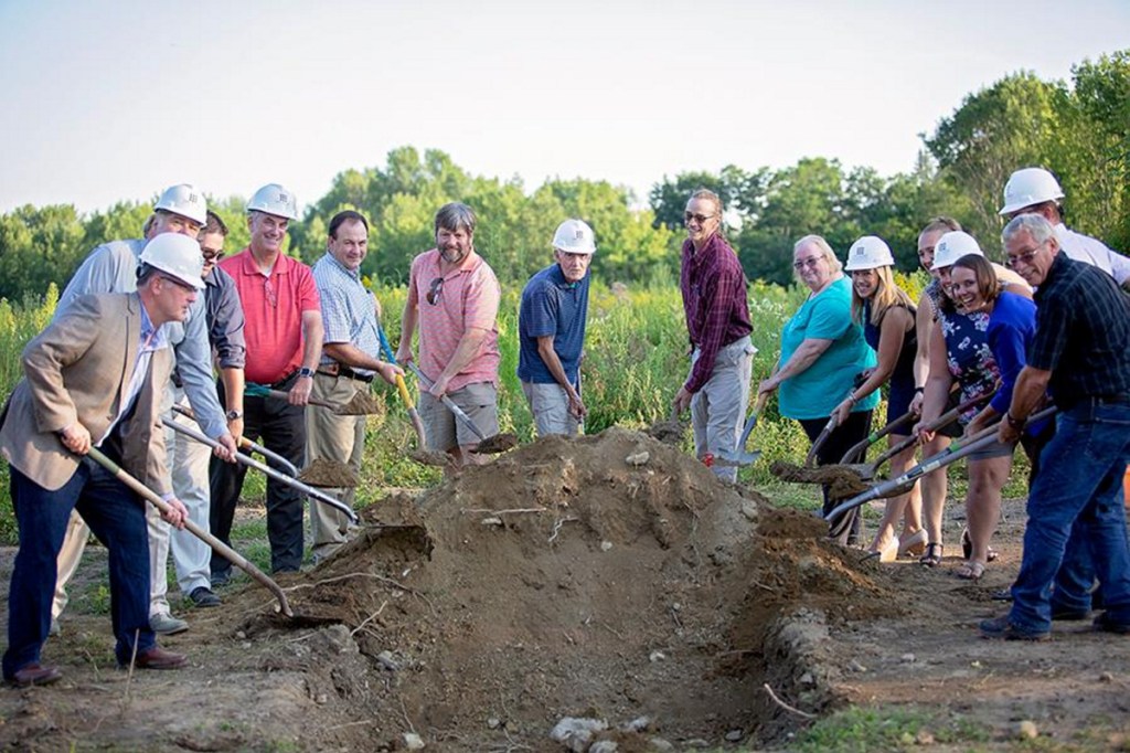Monmouth area officials help break ground on the town's new middle-elementary school on the evening of July 31. The school, which is expected to open in January 2020, is being mostly funded by the state.