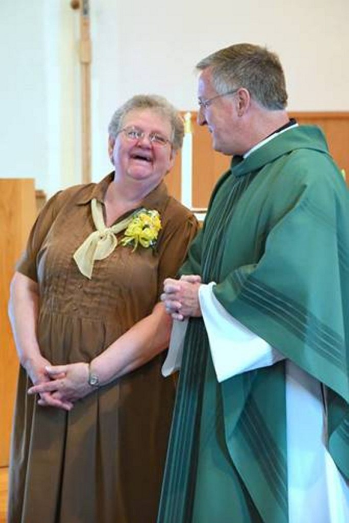 Sister Carol Martin talks with the Rev. John Skehan, pastor of St. Michael Parish.