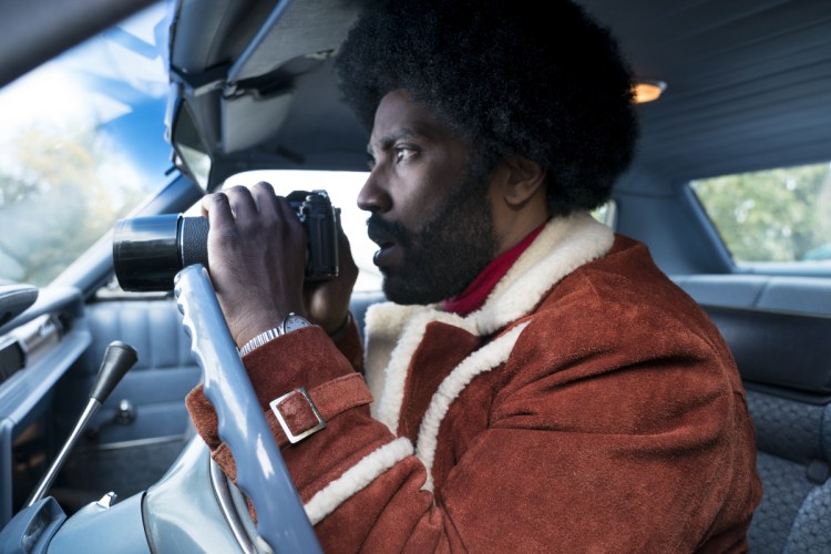 This image released by Focus Features shows John David Washington in a scene from "BlacKkKlansman."
