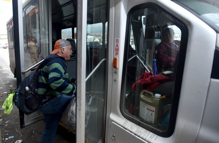 Gary Higginson, of South Gardiner, boards a KVCAP bus in April 2017 at the Save-A-Lot store in Waterville, bound for Augusta, where he will make a bus change and continue home to South Gardiner Higginson commented, "I like Waterville. It's a happening little town, and I couldn't get here if it wasn't for KVCAP and the $3.50 fare."