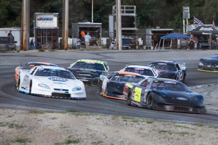 Three-time track champion Tim Brackett (60) races on the outside of Austin Teras (29) during a Pro All Stars Series race at Oxford Plains Speedway in July. Despite all of his success at Oxford, Brackett has never won the Oxford 250.