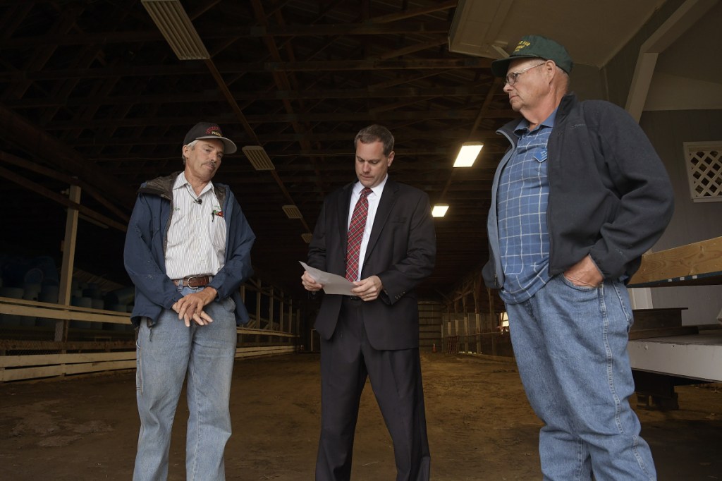 Litchfield Fair President Charlie Smith, left, attorney Kevin Sullivan and First Vice President Dick Brown assert Wednesday that about $80,000 is missing from the fair's bank accounts.