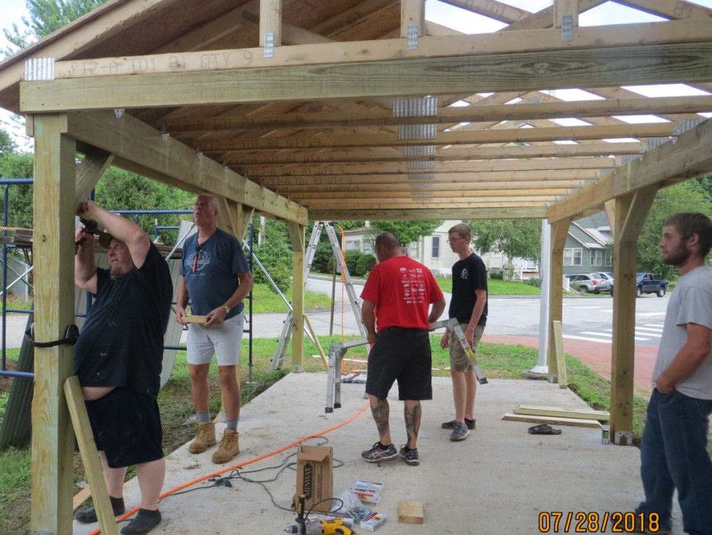 Alex Stewart, a member of Troop 479 in China, built a covered outdoor area at Lincoln School in Augusta as his Eagle Project. From left are Darren Cole, Chip Edgecomb, Jonathan Stoner, Scout Alex Stewart and Christian Hunter.