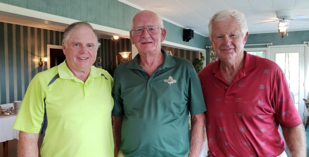 First Place — men's B division winners, from left, are Bob Fitzgibbon, Glenn Yankee and Carl Dodge. Bill McGuckin not shown in photo.