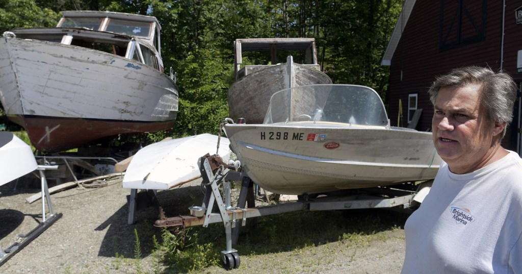 Shawn Grant in the boatyard July 16 at Brightside Marina, the business he owns in Belgrade Lakes Village. Grant is appealing the denial of a commercial business permit for the boat repair and slip company he has operated for 10 years on Hulin Road.