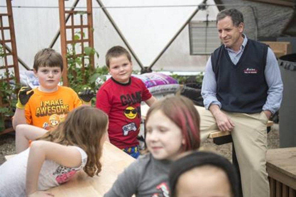 Garden to Table program participants, in front, from left, Emma Chaput, 8, Emma Gallagher, 6, Lahla Brann, 7, and in back, from left, Anderson Phinney, 8, and Xavier Bernardini, 7, with CEO Ken Walsh, Alfond Youth Center in Waterville.