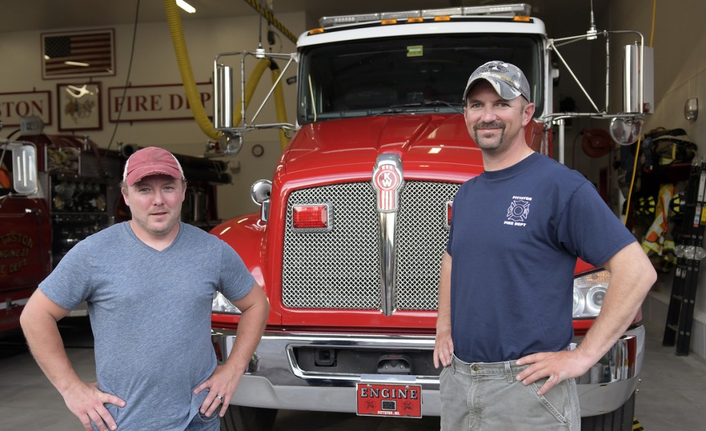 Josh Johnson, left, and Jason Farris at the Pittston Fire Department on Tuesday. Johnson has been promoted to chief of the department with Farris's stepping down from the position with the volunteer company.