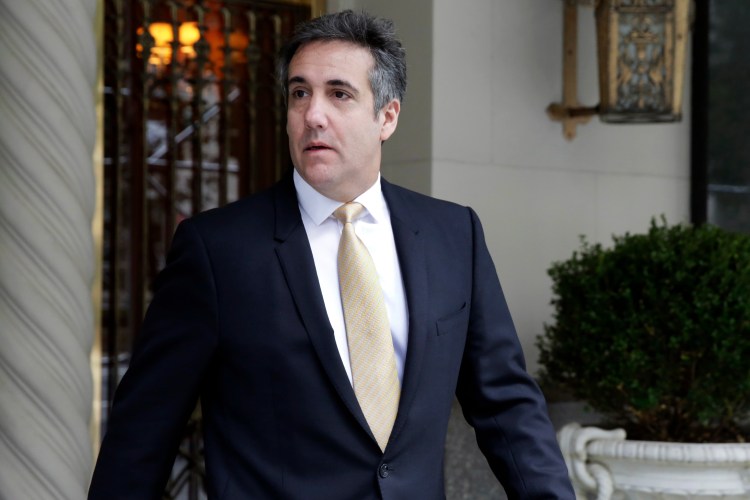 Michael Cohen, former personal lawyer to President Donald Trump, leaves his apartment building, in New York, Tuesday, Aug. 21, 2018. 