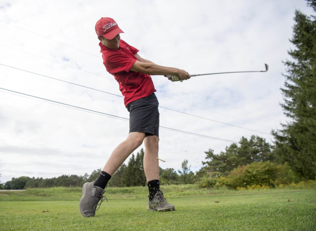 Cony golfer Kyle Douin hits a drive last week at Natanis Golf Course in Vassalboro.