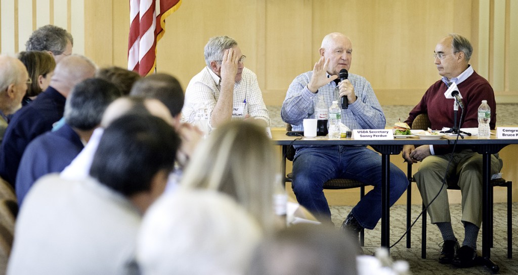 USDA Secretary Sonny Perdue, second from right, speaks during a roundtable discussion at Franklin Memorial Hospital in Farmington on Wednesday. U.S. Rep. Bruce Poliquin, R-Maine, is at right and Maine Department of Agriculture Commissioner Walter Whitcomb is to Perdue's left.