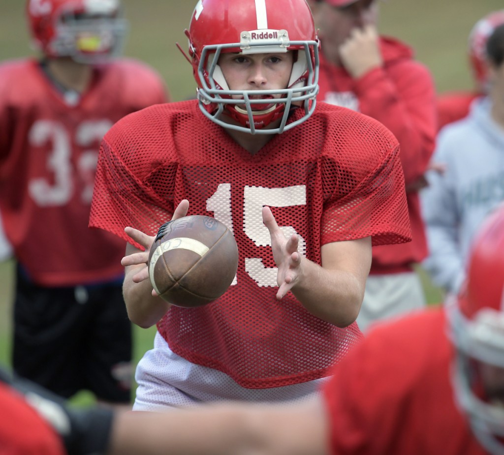 Staff photo by Andy Molloy
Cony High School quarterback Riley Geyer looks for an opening Wednesday at practice in Augusta.