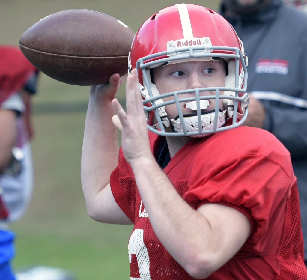 Staff photo by Andy Molloy
Cony High School quarterback Dakota Andow fires a pass Wednesday at practice in Augusta.