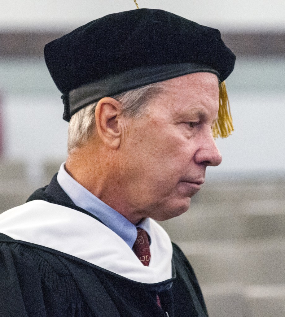 Keynote speaker Ben Bradlee Jr. appears before the annual University of Maine at Augusta convocation on Friday at the Augusta Civic Center.