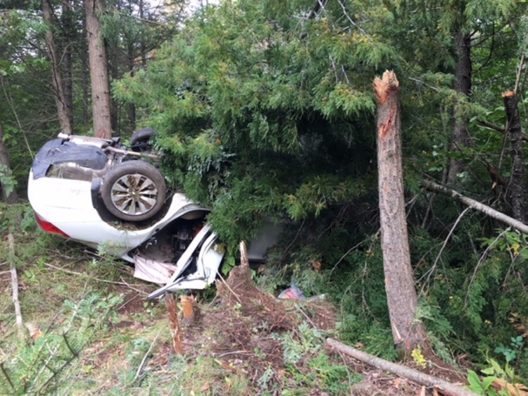 A white Honda Accord driven by Leslie Ridley Jr., of Skowhegan, crashed off Thurston Hill Road in Madison injuring three people, including Ridley, on Saturday police said.
