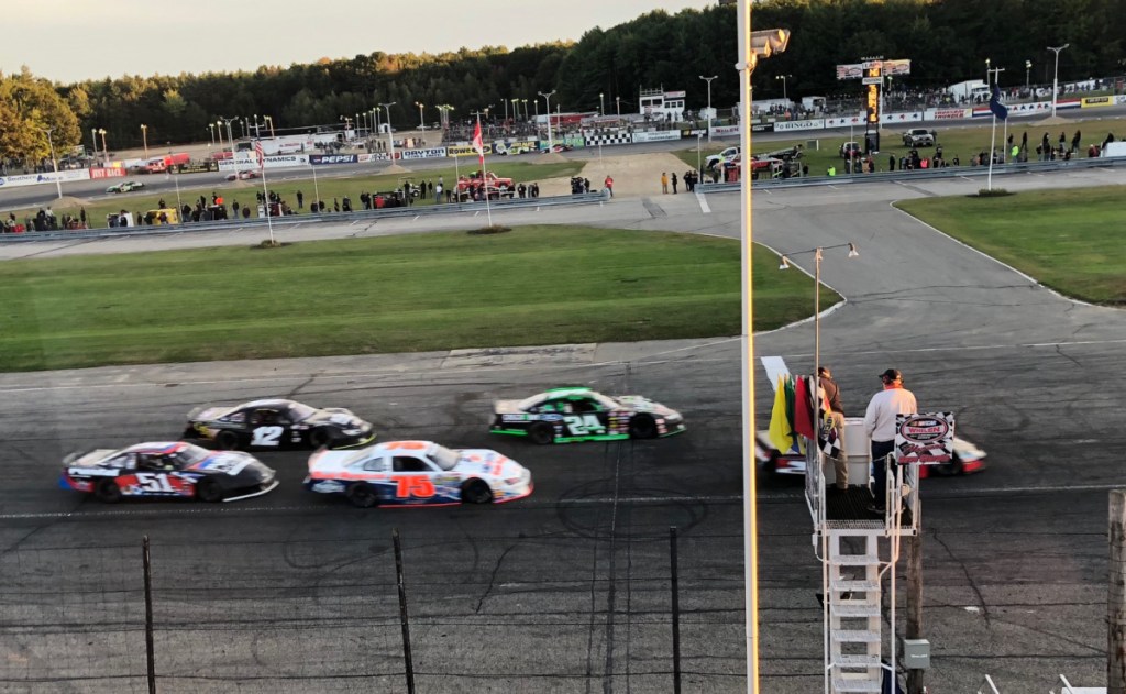Gary Smith (75) races in heavy traffic during the closing stages of the Pro All Stars Series 150 at Beech Ridge Motor Speedway in Scarborough on Sunday. Smith beat Jeff Taylor and Curtis Gerry for the win.