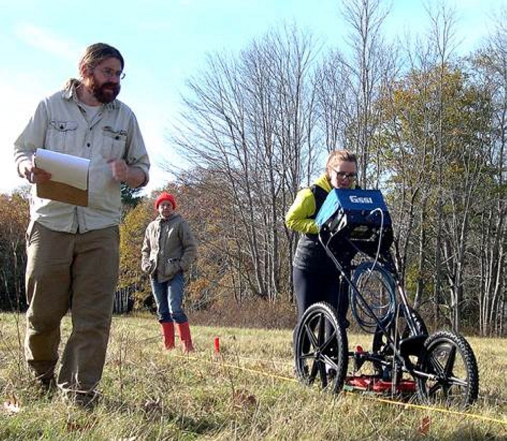 Andy Heller, left, with Alice Kelley and Jacque Miller conduct GPR survey.