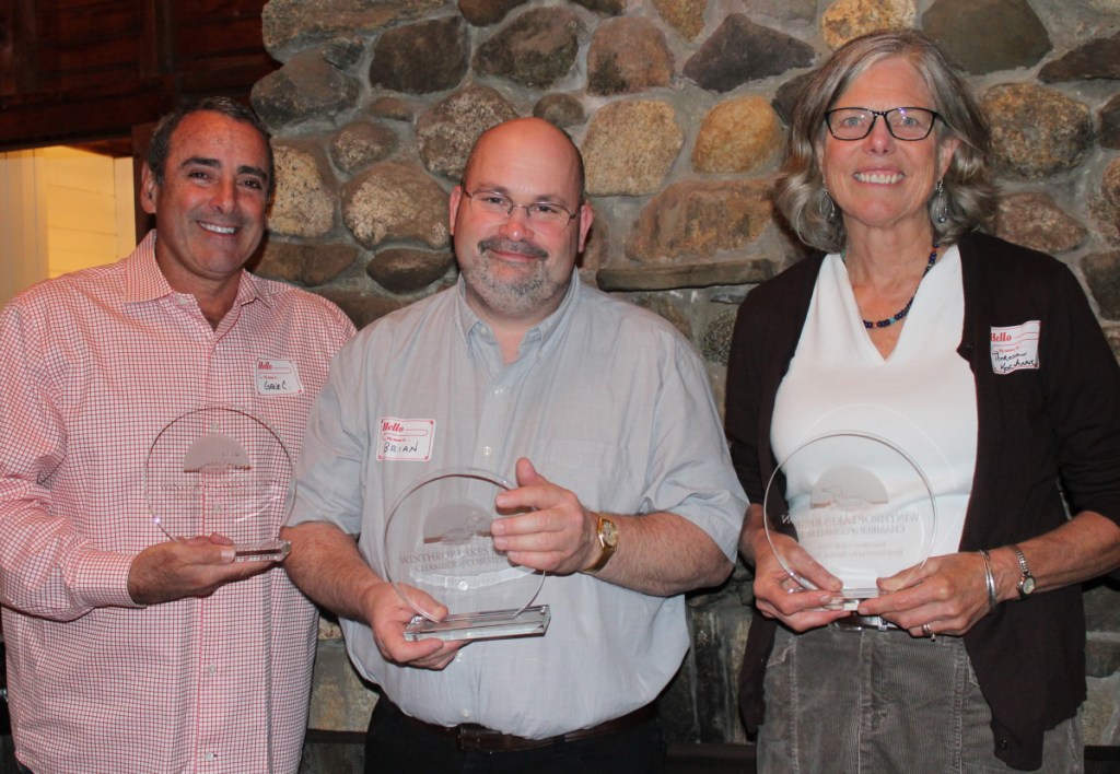 The Winthrop Lakes Region Chamber recently honored three of its members for their service to the community and its customers. From left to right: Gene Carbona, owner of The Barn at Silver Oaks Estate. Gene and his wife Veronica Carbona received the Entrepreneur Award for transforming an old Winthrop barn into one of the country's premier wedding and event destinations. Brian Ketchen, who owns Dave's Appliance, Inc. with his brothers, Mike and Scott, received the Dynasty Award for providing extraordinary customer service since 1970. Theresa Kerchner, director of Kennebec Land Trust, and her organization received the Public Service Award for their dedication to preserve land for public use and recreation in Central Maine. For more information, contact the chamber at 377-8020 or <a href="mailto:info%40winthropchamber.org?subject=">info@winthropchamber.org</a>.