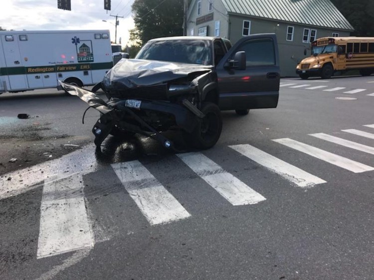 A 2002 Chevrolet Silverado was damaged heavily in a two-vehicle crash Thursday morning in Skowhegan, sending two high school students to the hospital.