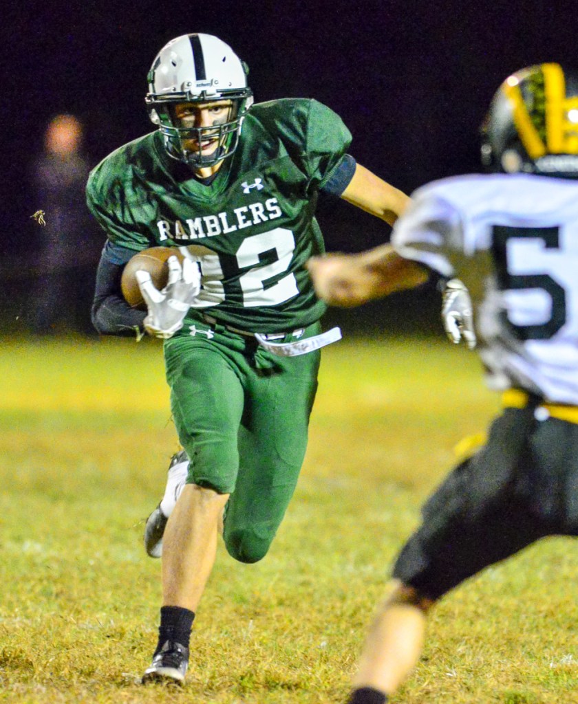 Winthrop/Monmouth/Hall-Dale running back Ian Steele runs with the ball against Maranacook on Friday at Maxwell Field in Winthrop.
