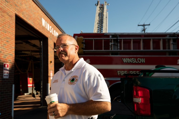 Newly arrived Winslow Fire Department Chief Ronald "Ronnie" Rodriguez stands in front of the Winslow Fire Department on Saturday morning during the department's open house.