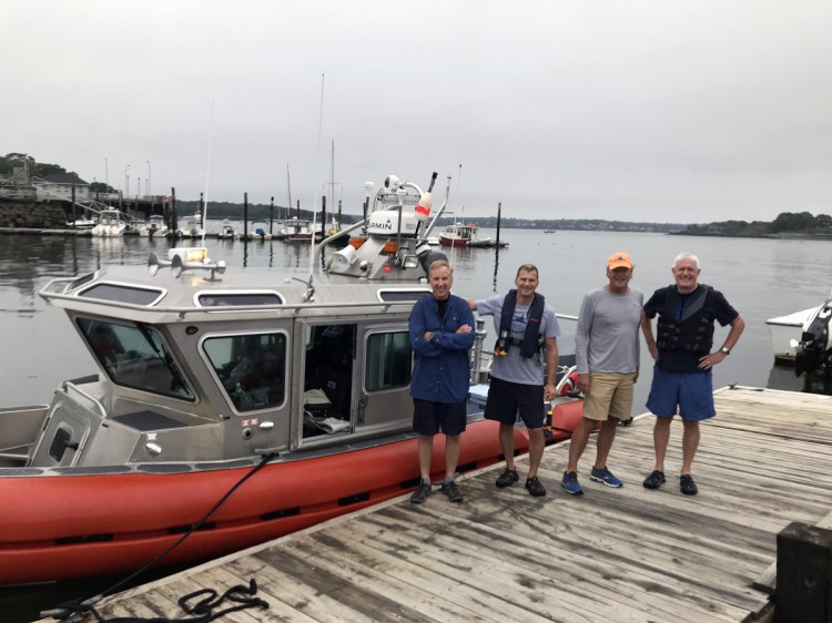 Ford Reiche, second from right, proposed taking his 25-foot former Coast Guard response boat on an unprecedented sprint from Kittery to Lubec, and did so on Aug. 13. With him are, from left, Tux Turkel, Doug Welch and Mark Fasold.