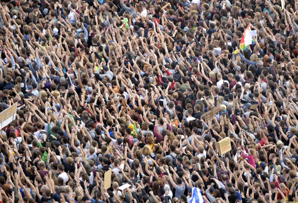 Visitors attend a concert against far-right protests in Chemnitz, Germany, on Monday. Thousands of people were expected to attend the free, open-air concert intended to send a signal against hatred and anti-migrant sentiment.