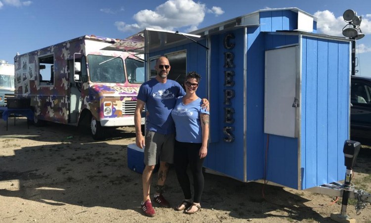Lonnie Stinson and Brandi Haaf, owners of Crepe Elizabeth, prepare for a crowd in August at Thompson's Point in Portland.