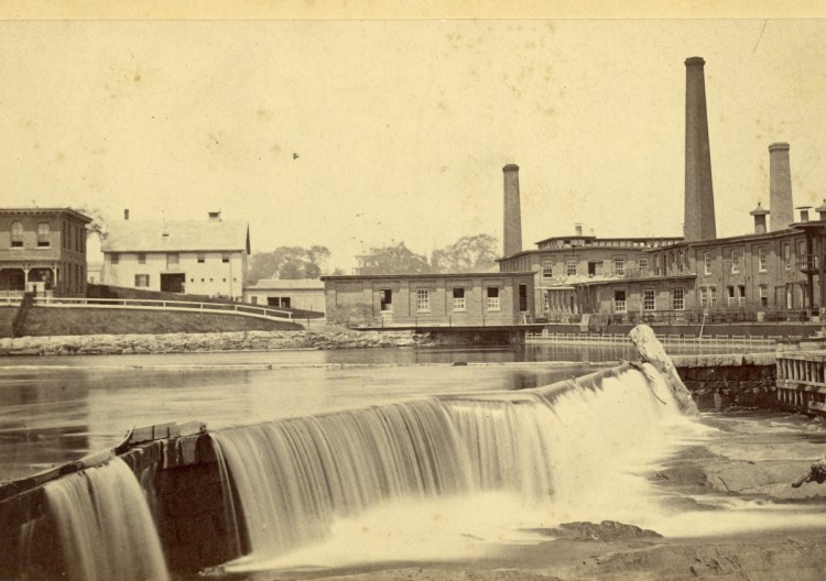 The S.D. Warren Co. paper mill, shown in this 1884 photo, was established on the banks of the Presumpscot River in 1854.