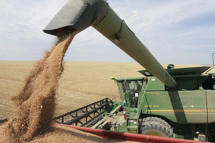 Wheat harvest near Patterson, Wash. in 2012.The trade war with China is making life difficult for many farmers across Washington state. Washington State stands to lose $480 million in agricultural exports to China because of retaliatory tariffs, according to the state Department of Agriculture.