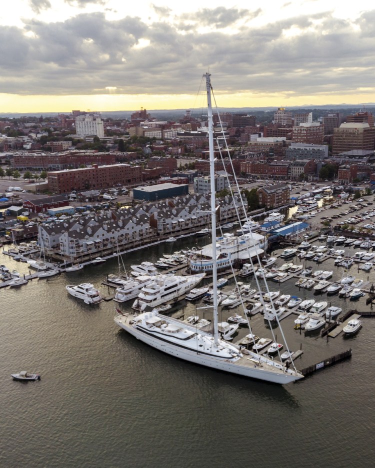 The M5, the largest single-masted yacht ever built, dwarfs other boats at DiMillo's Marina in Portland. The luxury yacht measures 277 feet long by 54 feet wide and comfortably sleeps 12. The vessel has room for a smaller yacht held inside its hull, and deck space for a small float plane.